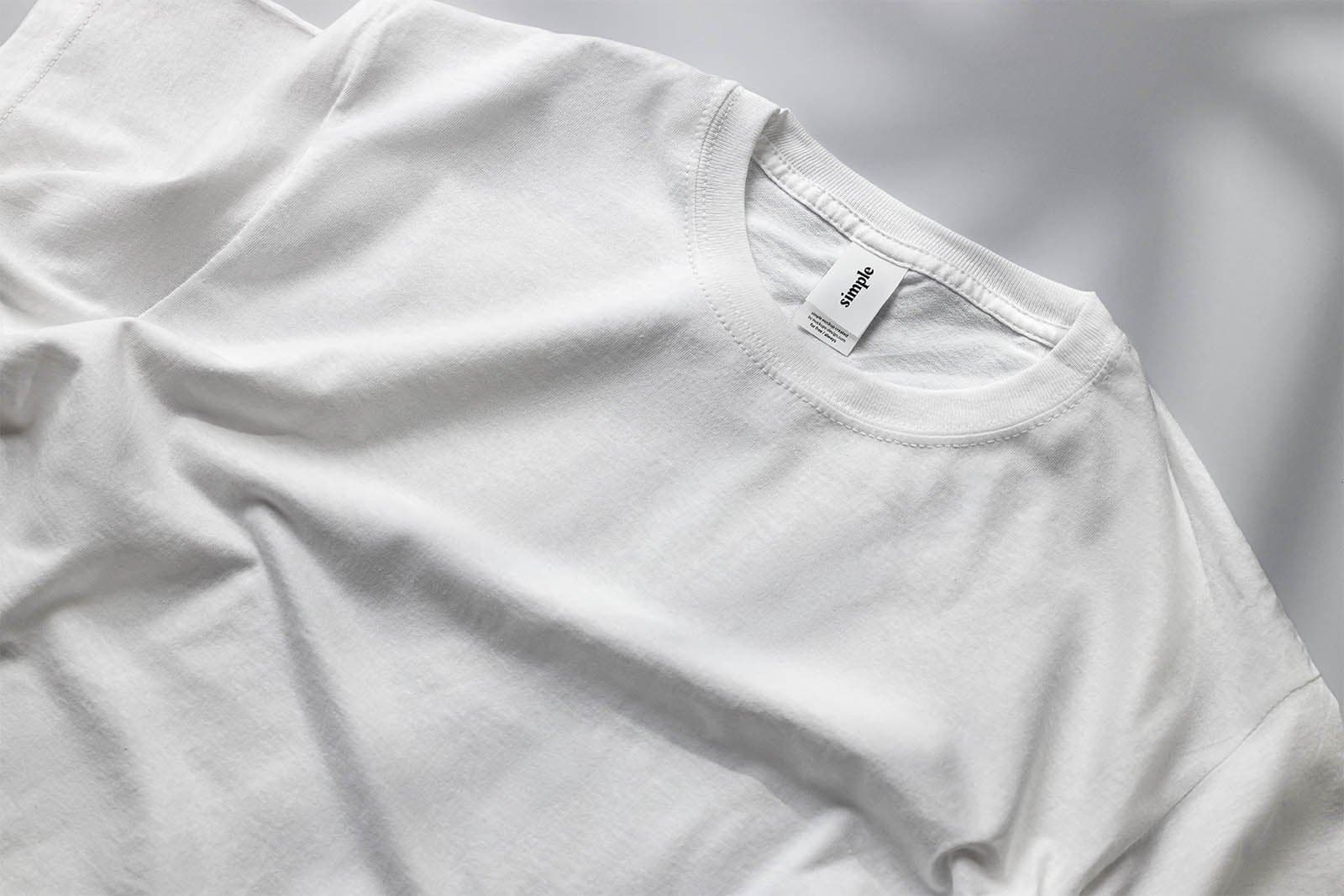 The plain white tee the mockups are built on