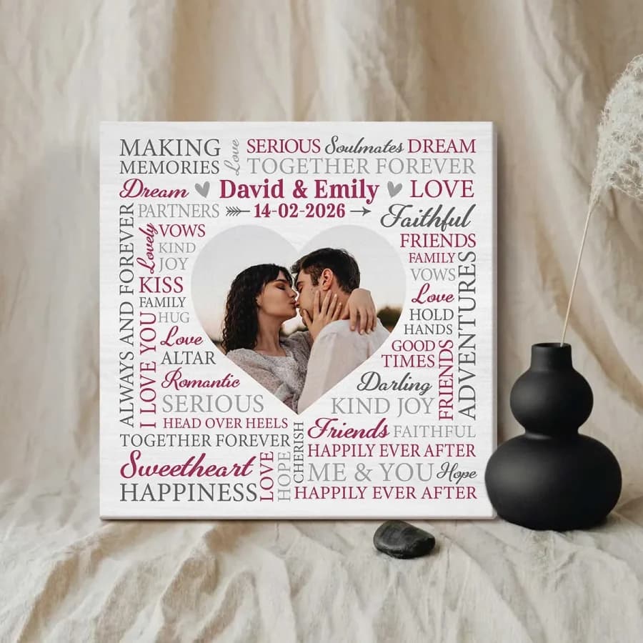 A square canvas of words packed around a heart-shaped photo of a couple, with their names and date across the middle